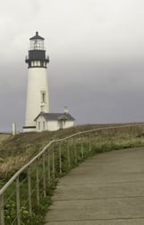 Yaquina Head Lighthouse, a popular tourist attraction built in 1871 in Newport, Oregon, on a stormy morning in September along the Pacific coast